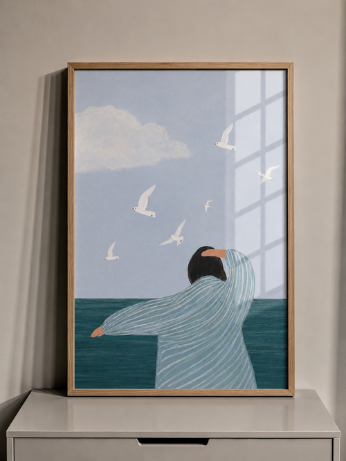 Blue coastal framed wall art with sea view and white birds